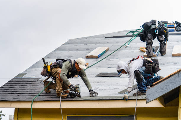 Professional Storm Damage Roof Repair technician working in Liberty, PA